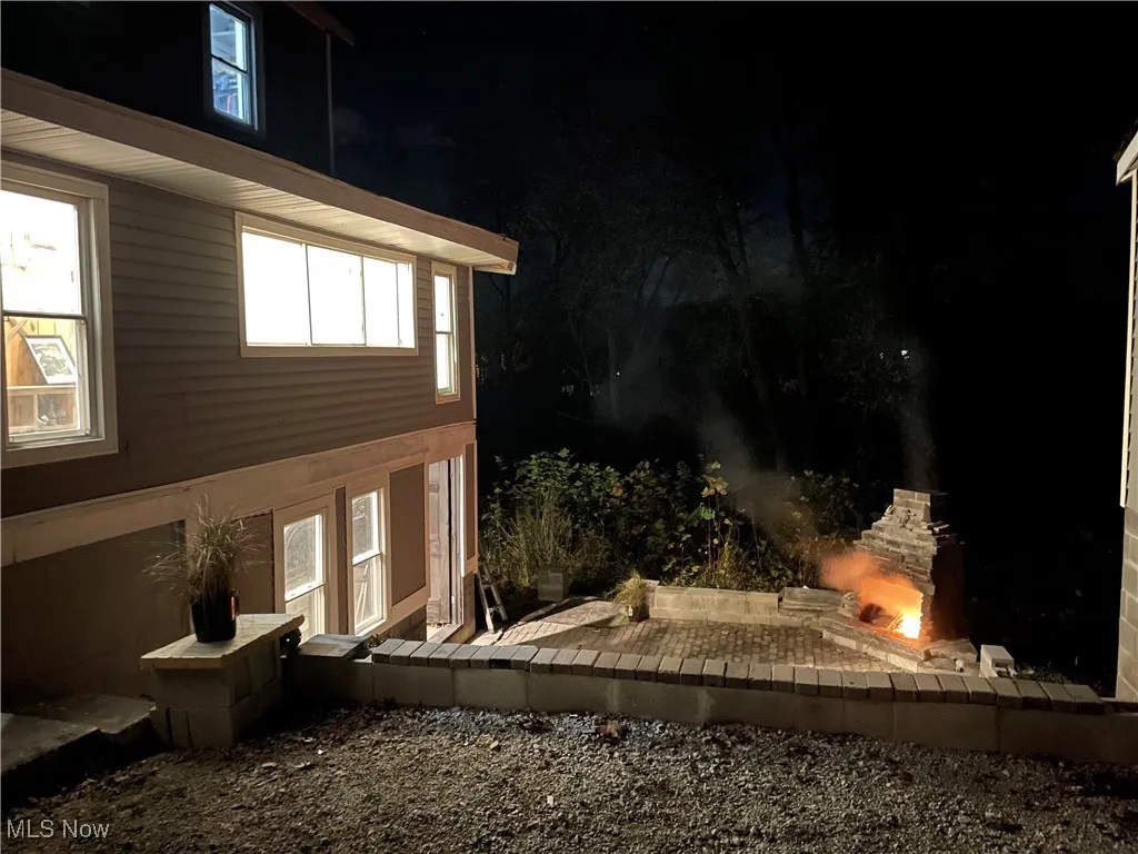 View of property exterior at twilight