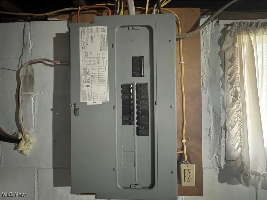 Utility room featuring electric panel