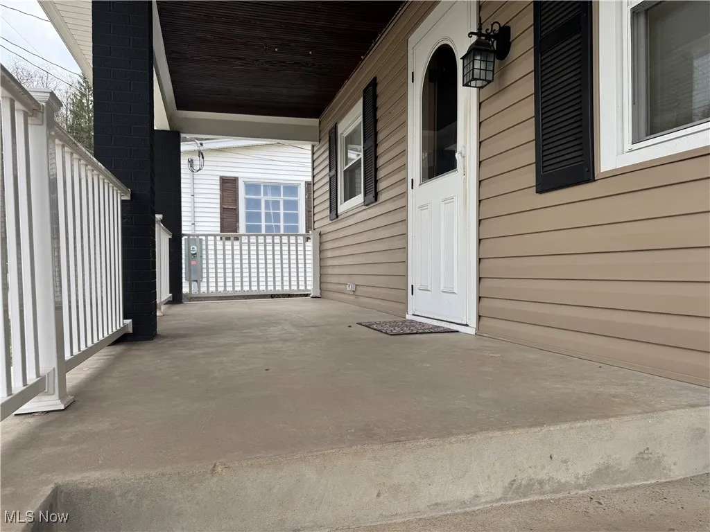 View of patio with covered porch