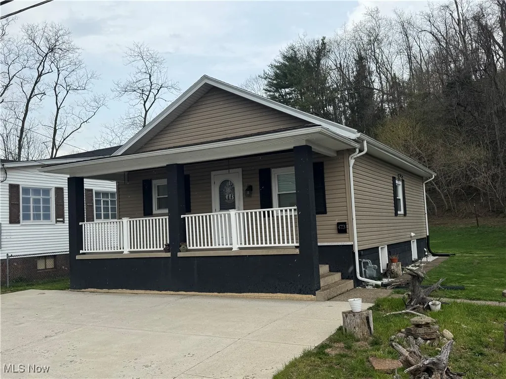 View of front of property with a porch