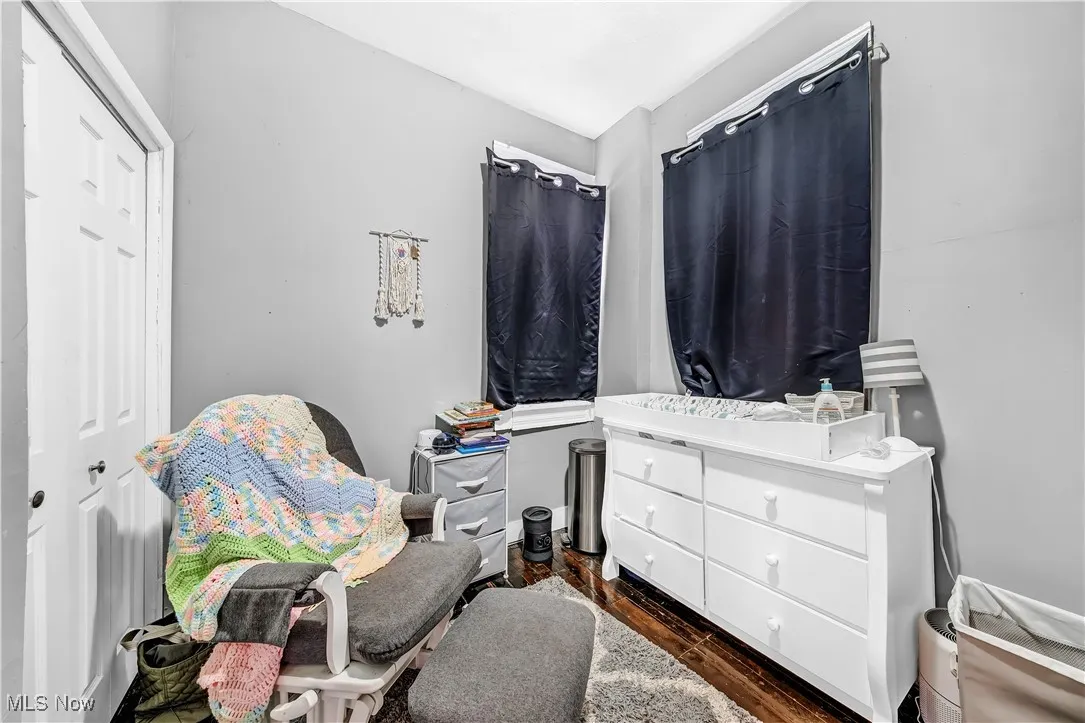 Bedroom featuring dark wood finished floors