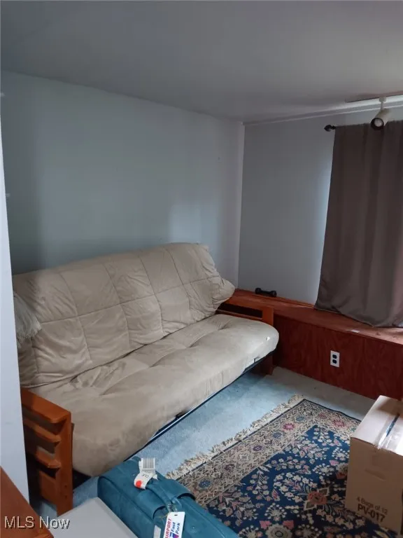 area of bedroom that could be another bedroom or office.