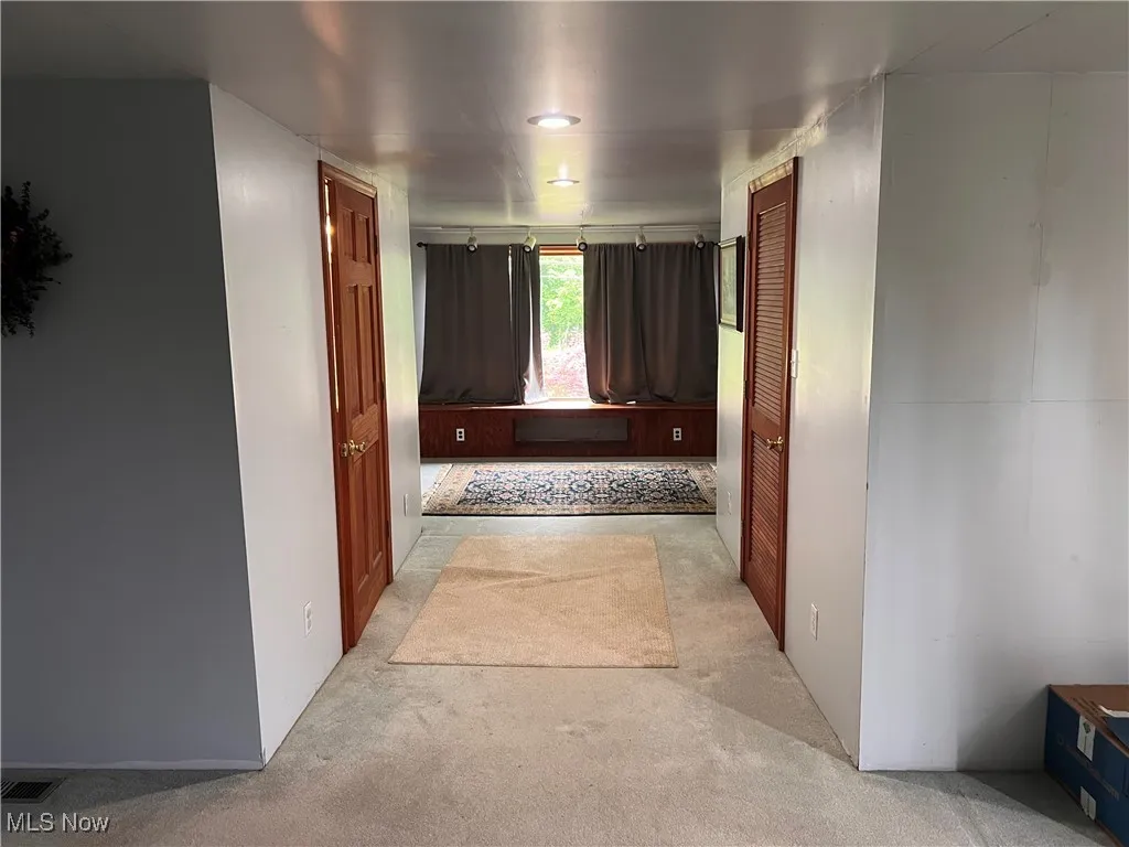 Large bedroom with walk in closet and half bath
