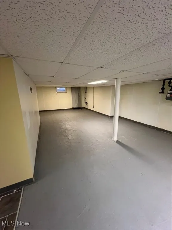 Basement featuring a drop ceiling