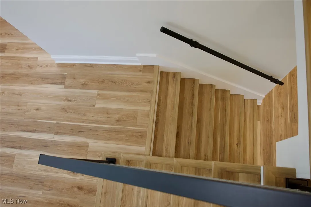 Stairway from the second floor looking down to the stairway of the mudroom/laundry room