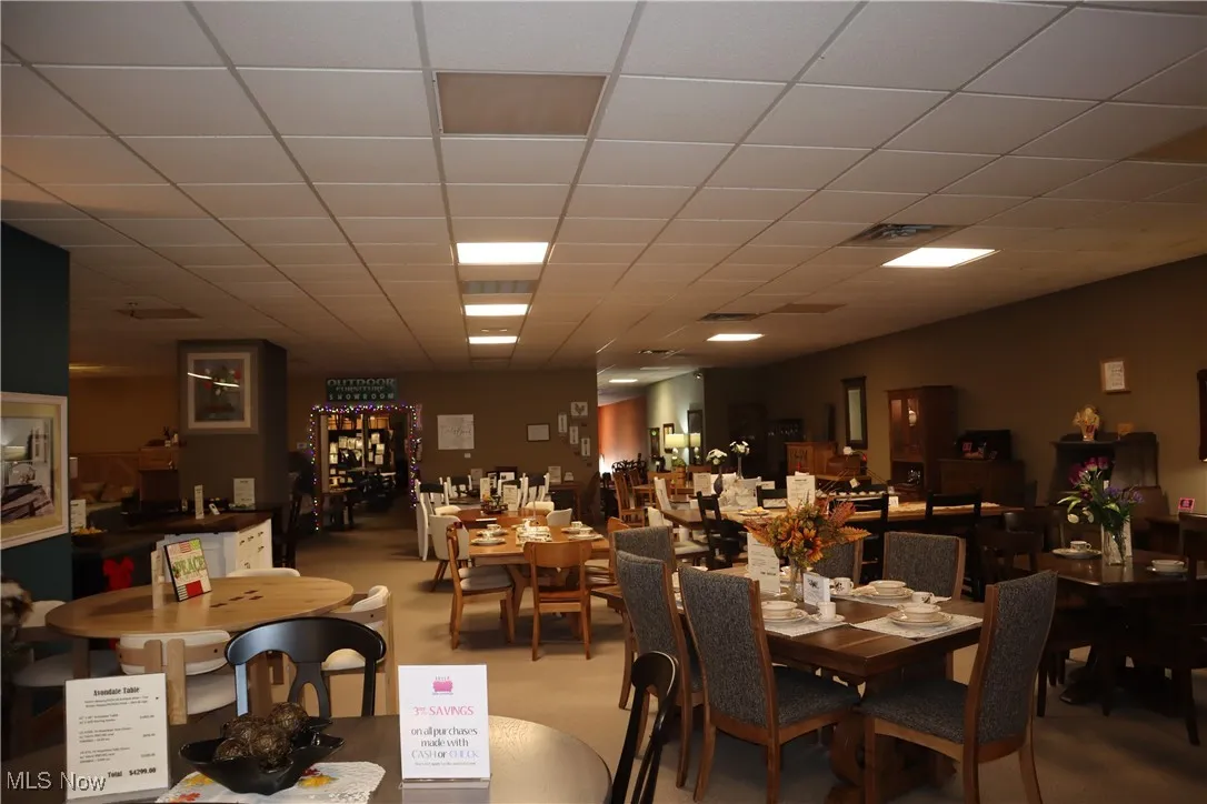 Dining room with a drop ceiling