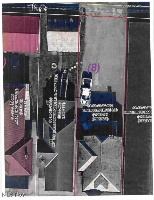 Aerial overview of property's location featuring property boundaries highlighted