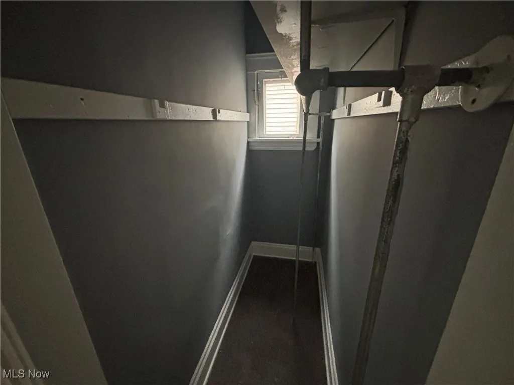 Below grade area featuring baseboards