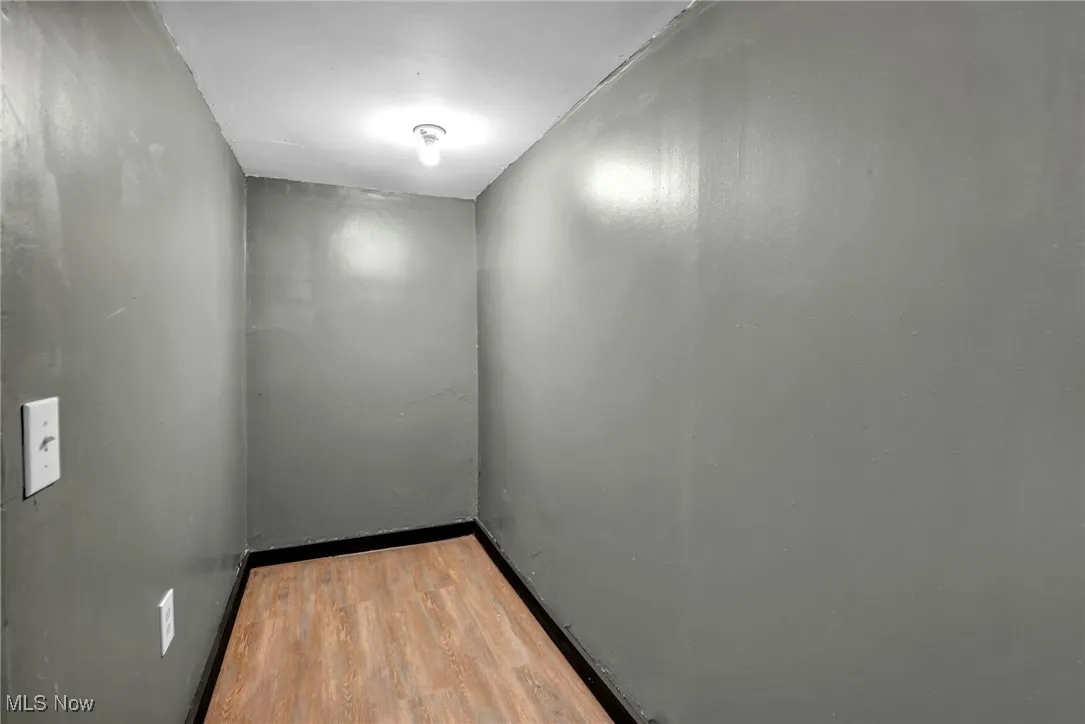 Spare room with light wood-style flooring