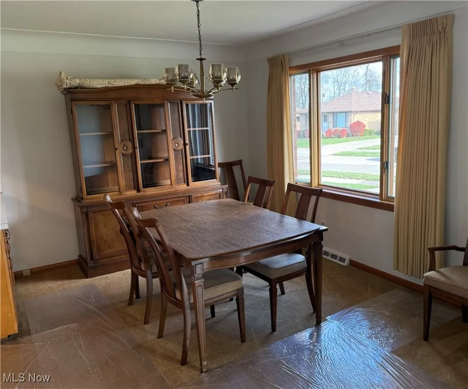 Carpeted dining​​‌​​​​‌​​‌‌​‌‌​​​‌‌​‌​‌​‌​​​‌​​ room