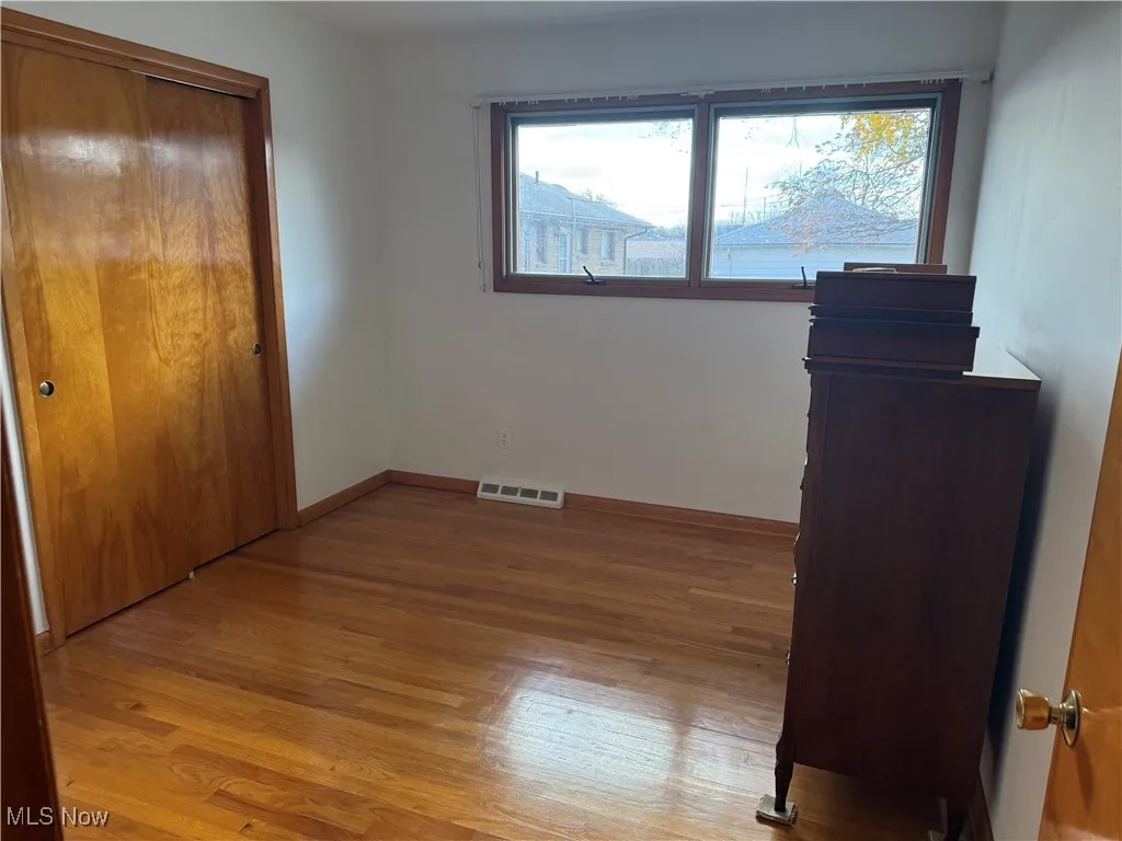 Bedroom with hardwood floor