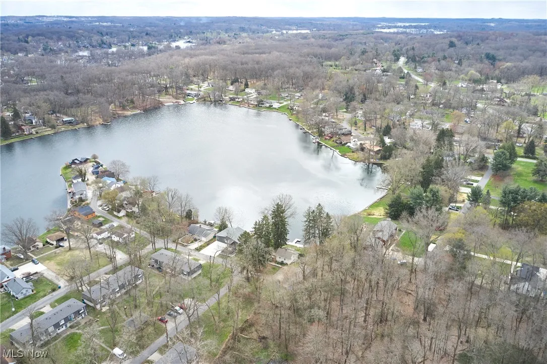 Bird's eye view with a residential view and a water view