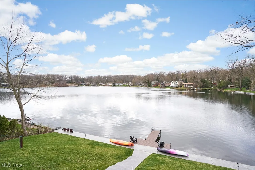 View of water feature with a boat dock