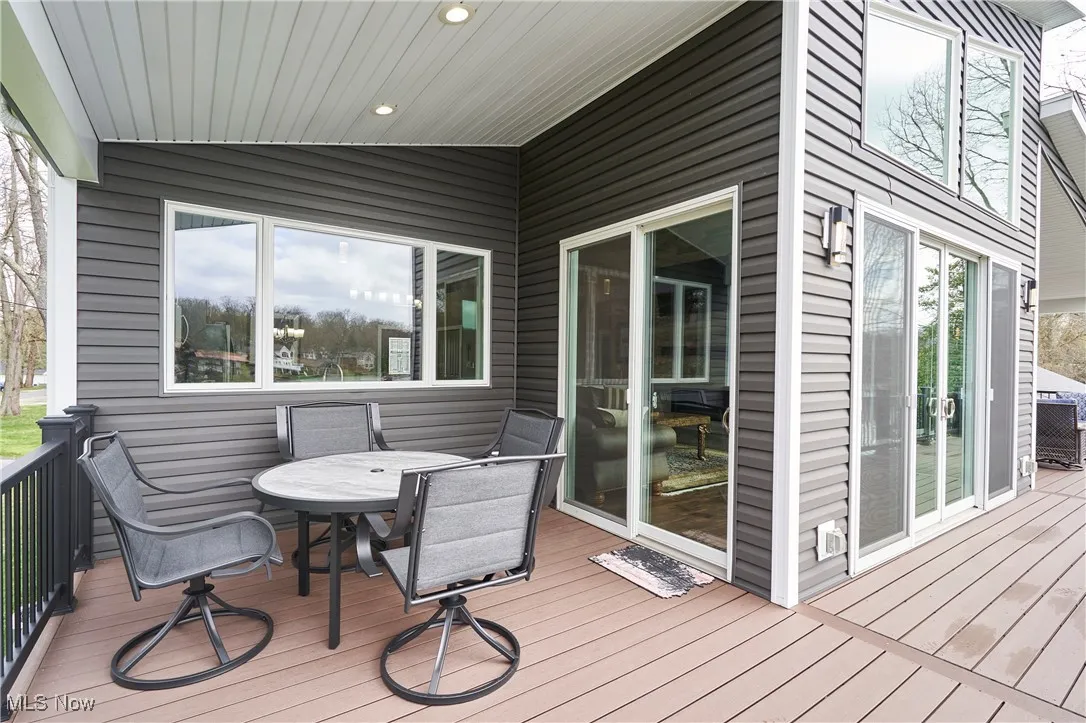 Wooden terrace with outdoor dining area
