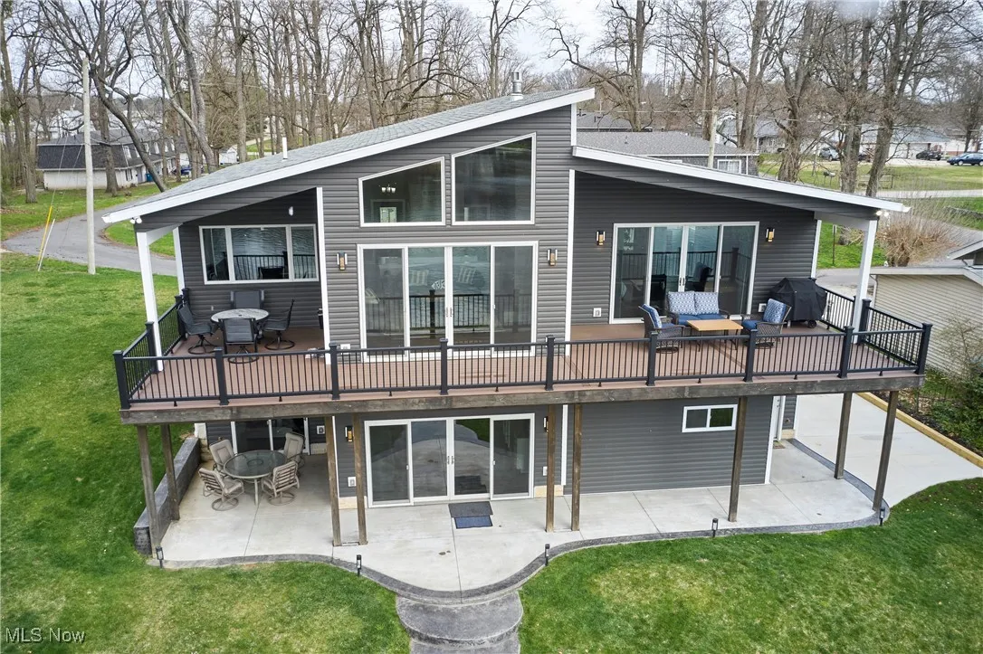 Rear view of property with a patio, a deck, central AC, and a​​‌​​​​‌​​‌‌​‌‌​​​‌‌​‌​‌​‌​​​‌​​ lawn