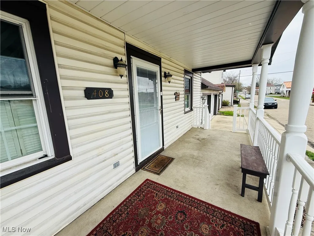View of patio with a porch
