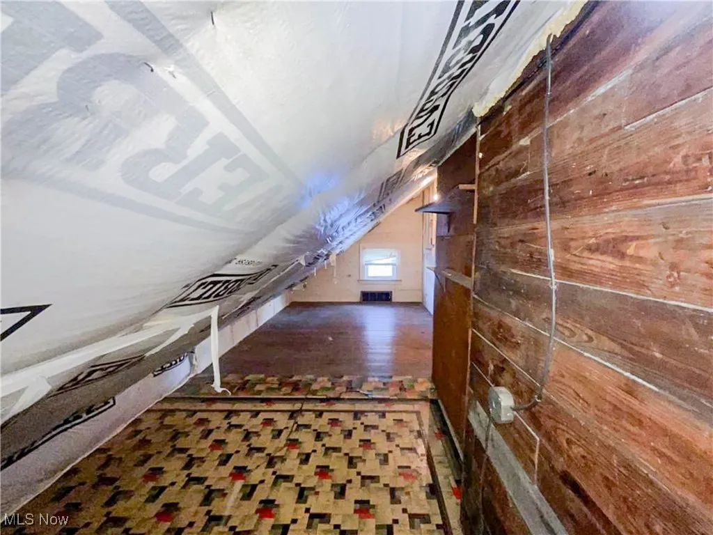 Bonus room with wooden walls
