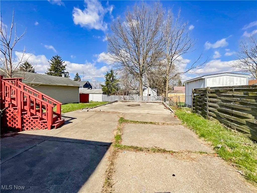 View of road with concrete driveway
