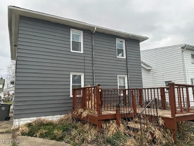 Rear view of house featuring a deck
