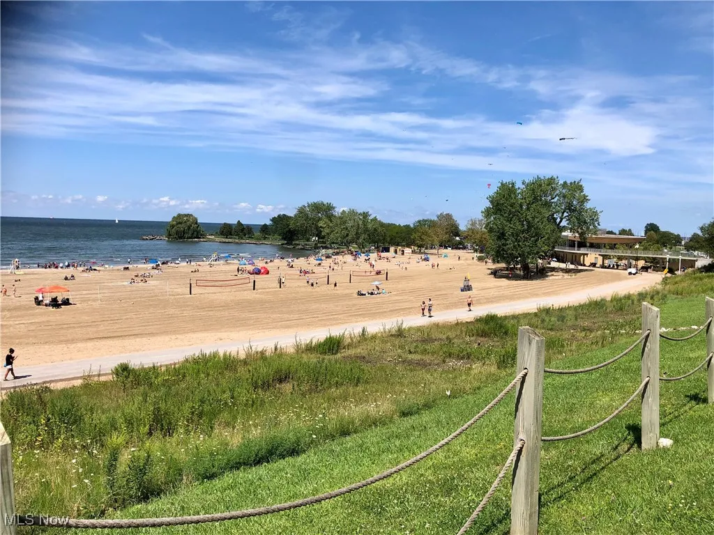 View of water feature featuring a beach view