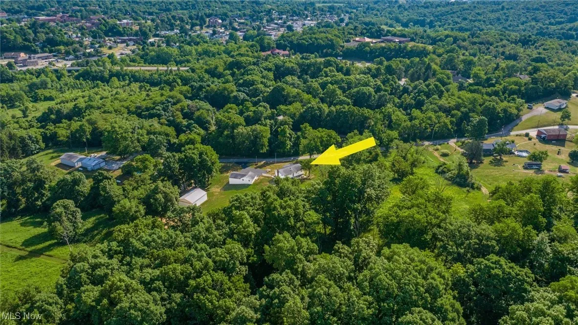 Bird's eye view with a wooded view