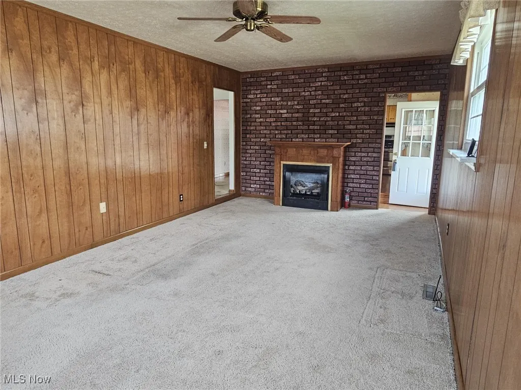 Hallway to bedrooms and bath with 3 closets