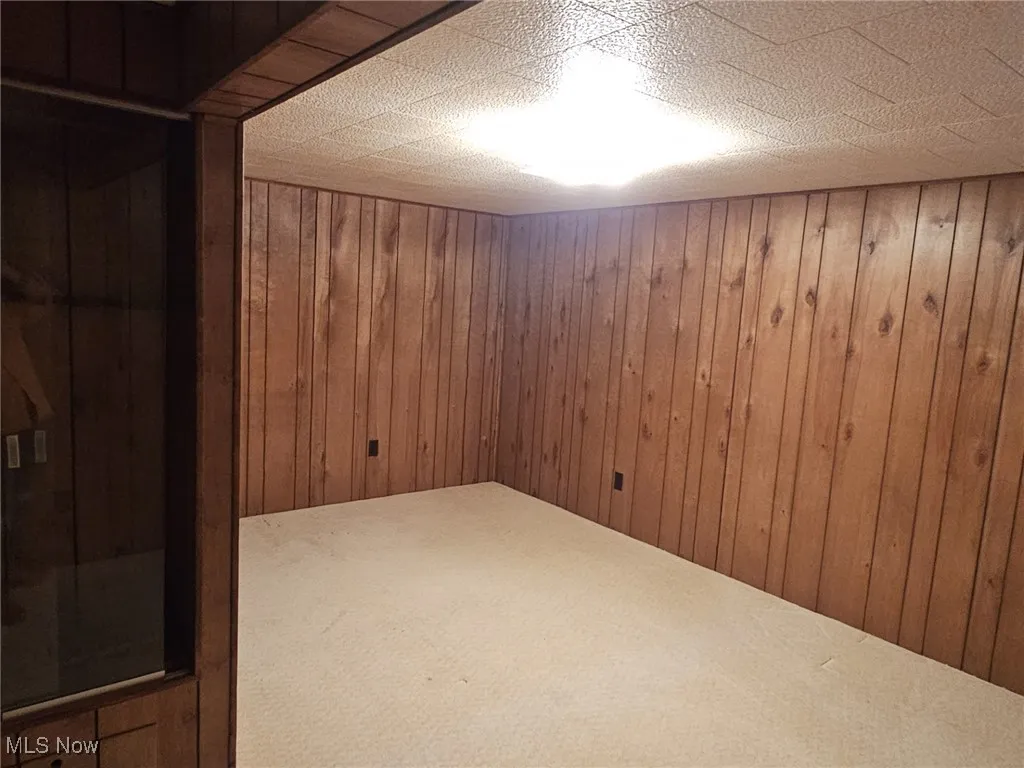 Finished below grade area with closet and small window, formerly used as bedroom 4