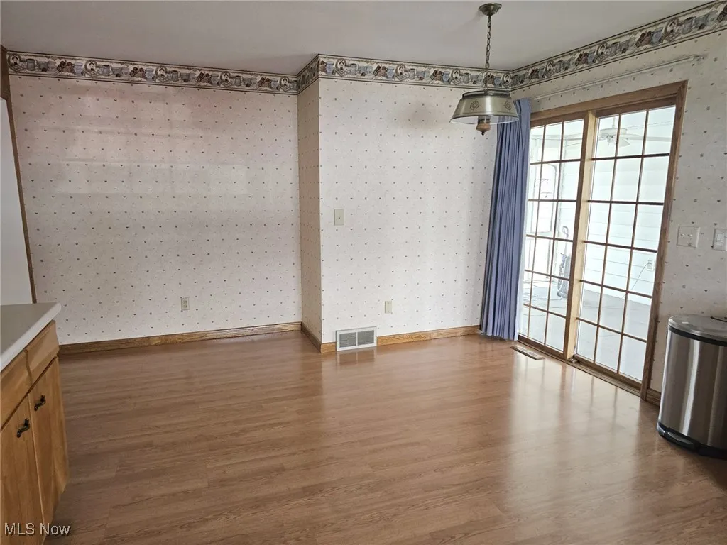 Former garage turned family room....could be used as Dining Room
