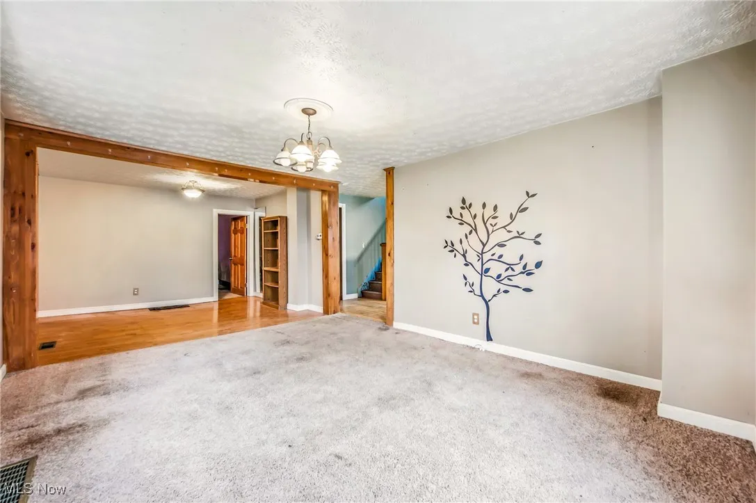 Entrance from the kitchen area into the living and dining area