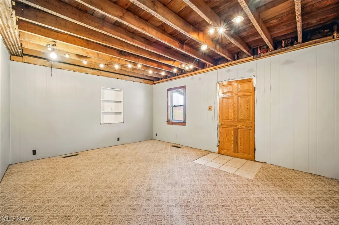 Bedroom with doorway to the front porch