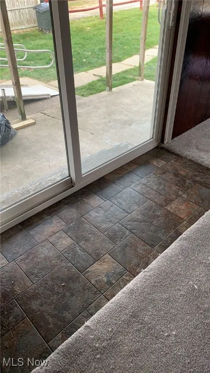 Entryway with stone tile floors