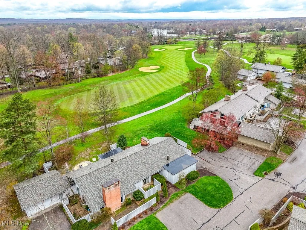 Birds eye view of property featuring a residential view and view of golf course