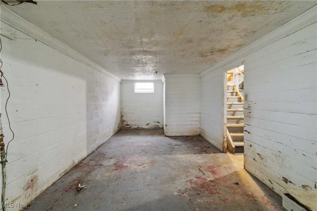 Below grade area with crown molding