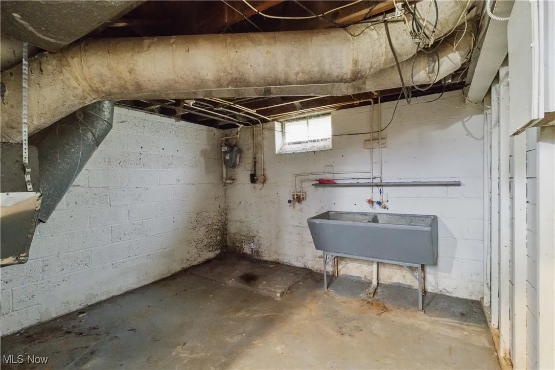 Below grade area featuring a sink