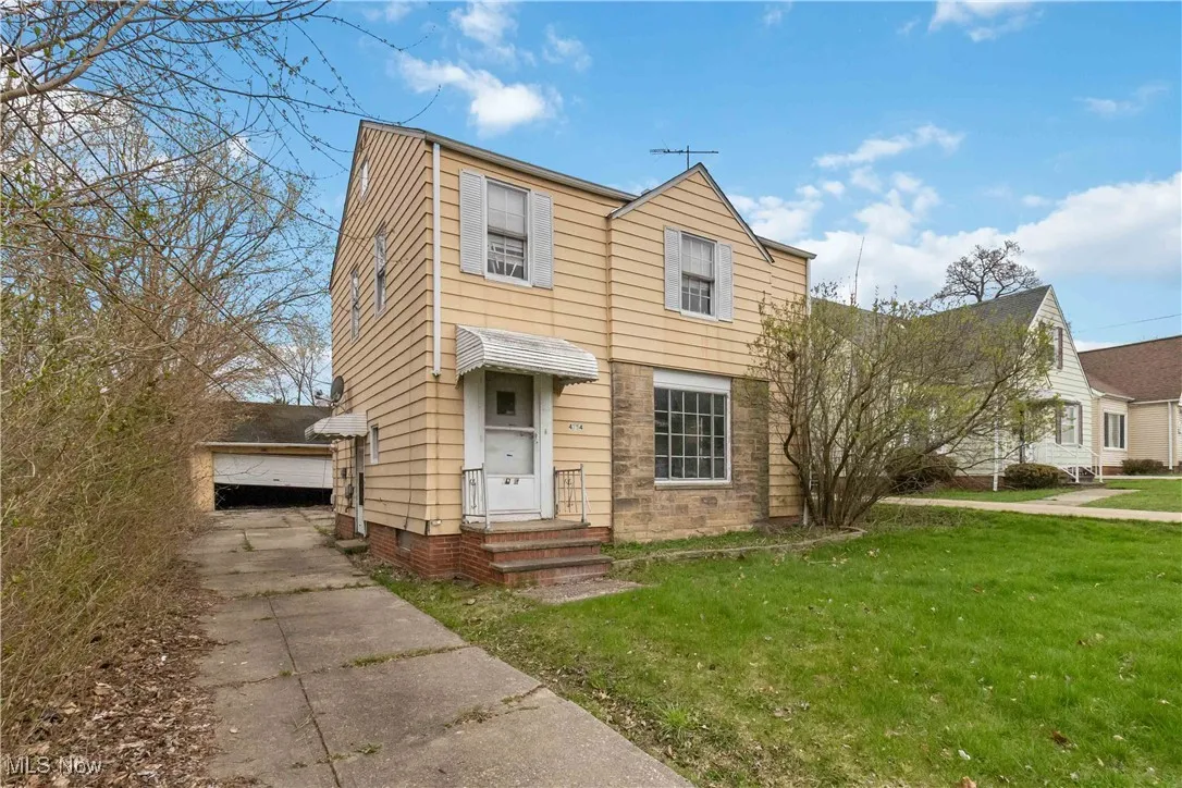 View of front of home with a front lawn