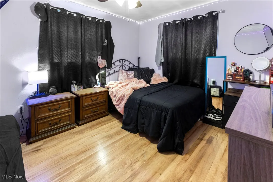 Bedroom featuring light wood-style floors and ceiling fan