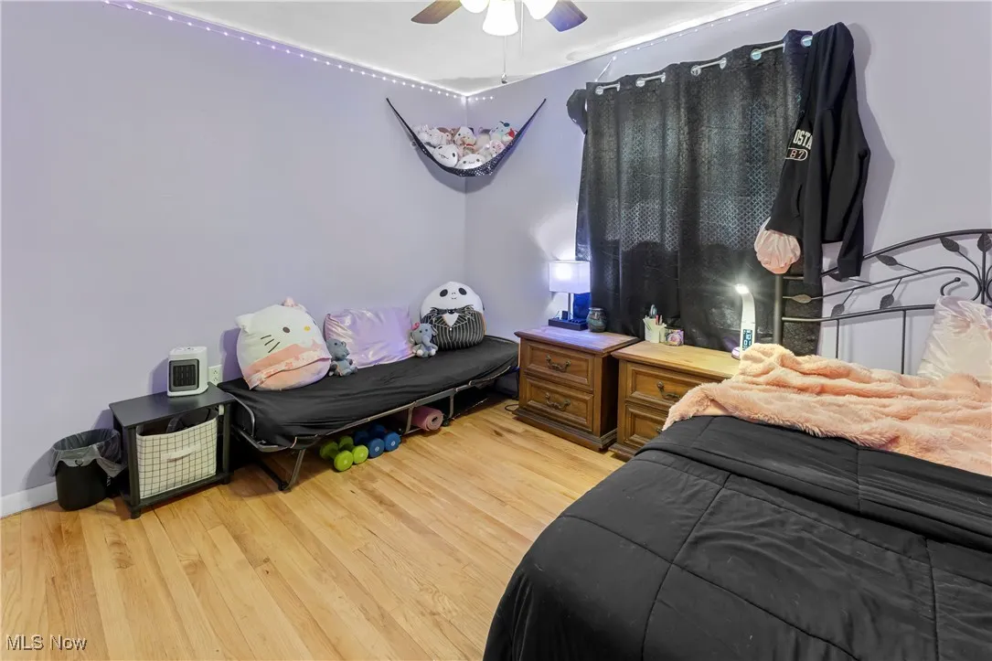 Bedroom featuring ceiling fan and light wood-style floors