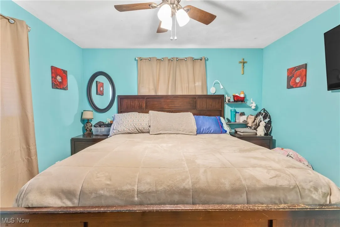 Bedroom featuring ceiling fan