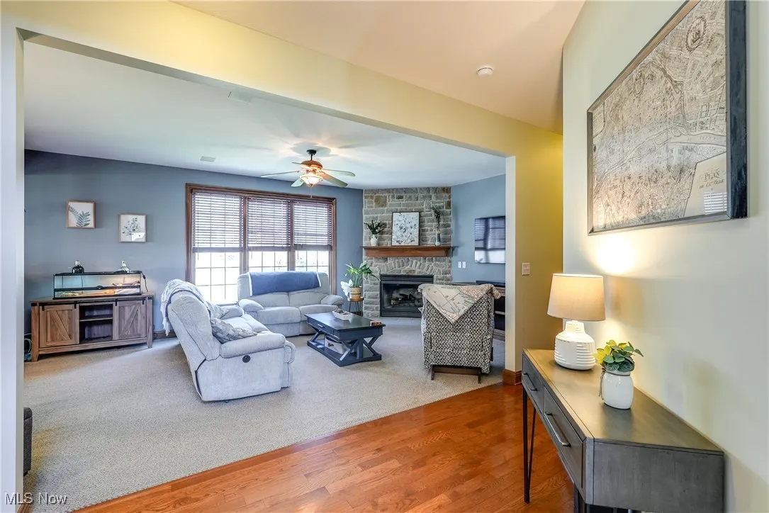 Wonderful family room off the kitchen & dinette with stone fireplace and gas logs.