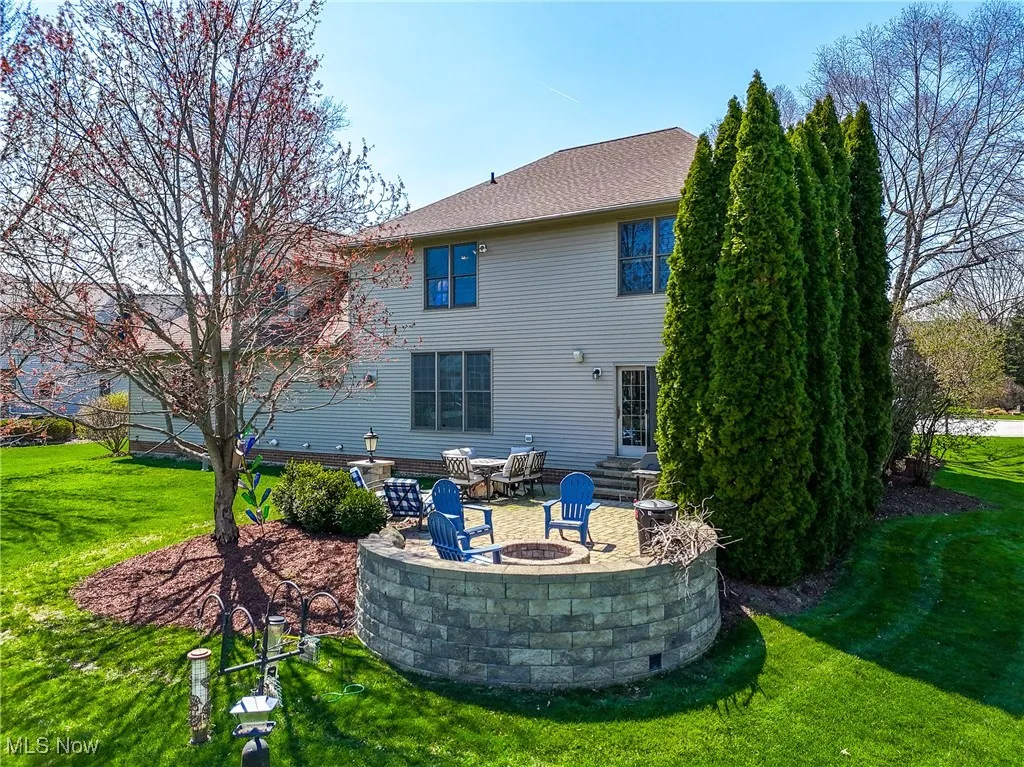 Beautiful back yard with patio and built-in fire pit
