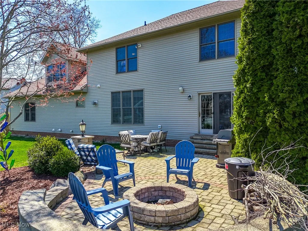 Beautiful back yard with patio and built-in fire pit