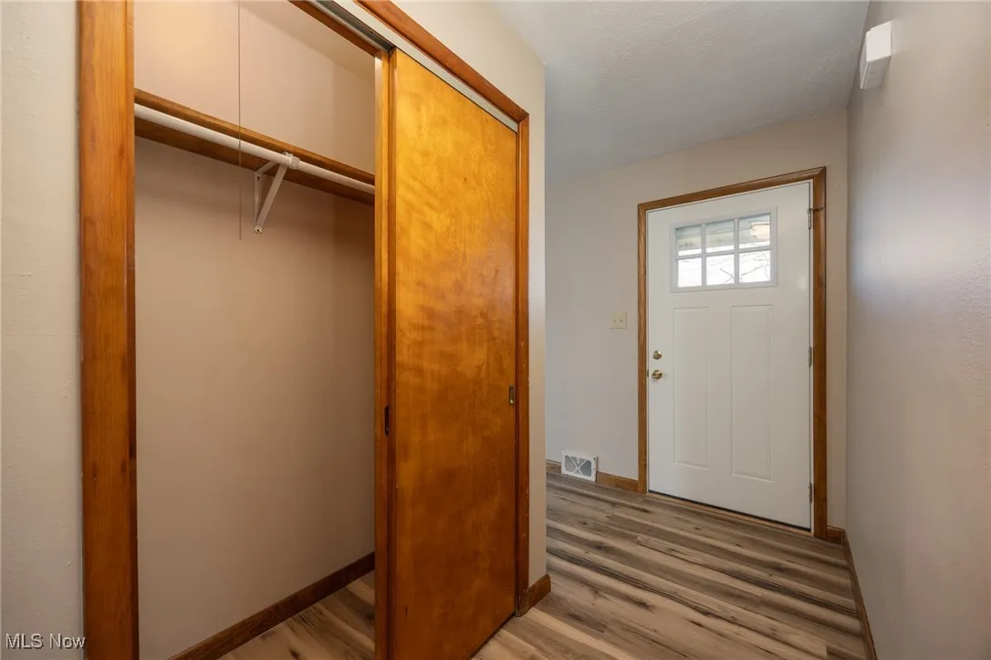 Entry closet with visible vents