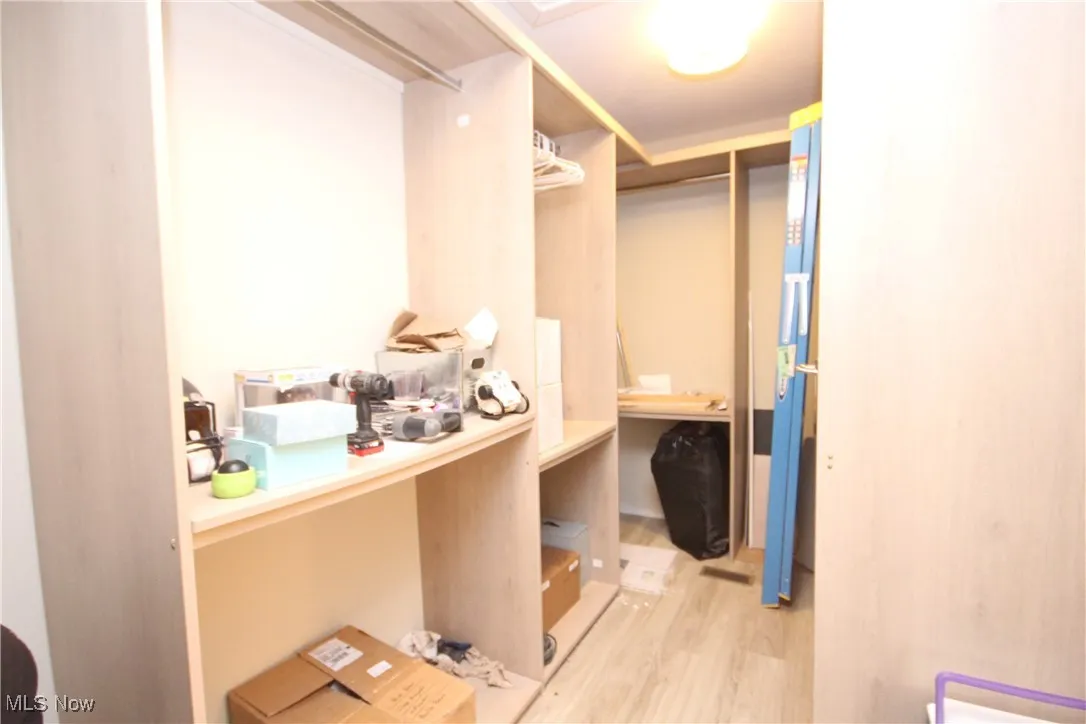 In-law suite storage closet with aundry hook up in the back corner
