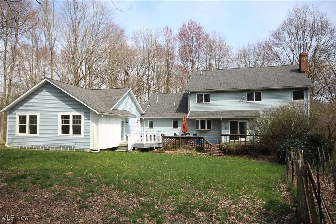 Back of the home with deck