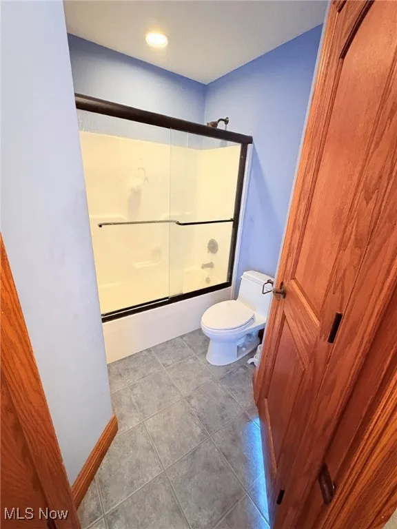 Jack and Jill bathroom shared bathtub/shower.