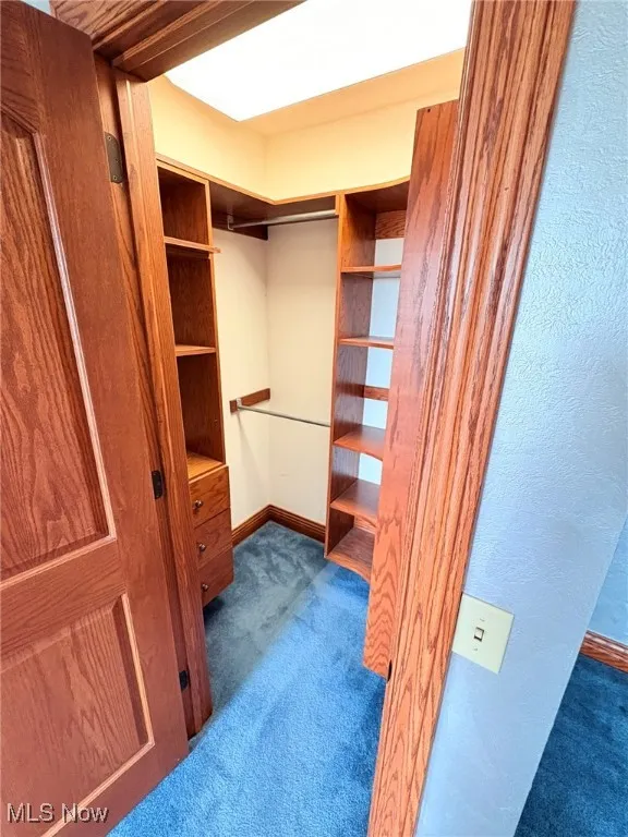 upstairs fourth bedroom walk in closet.