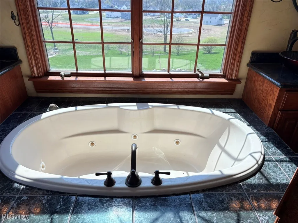 soaking tub in owner's suite bathroom.