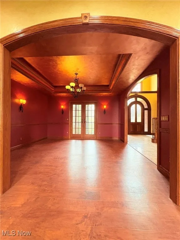 Dining room with tray ceiling.