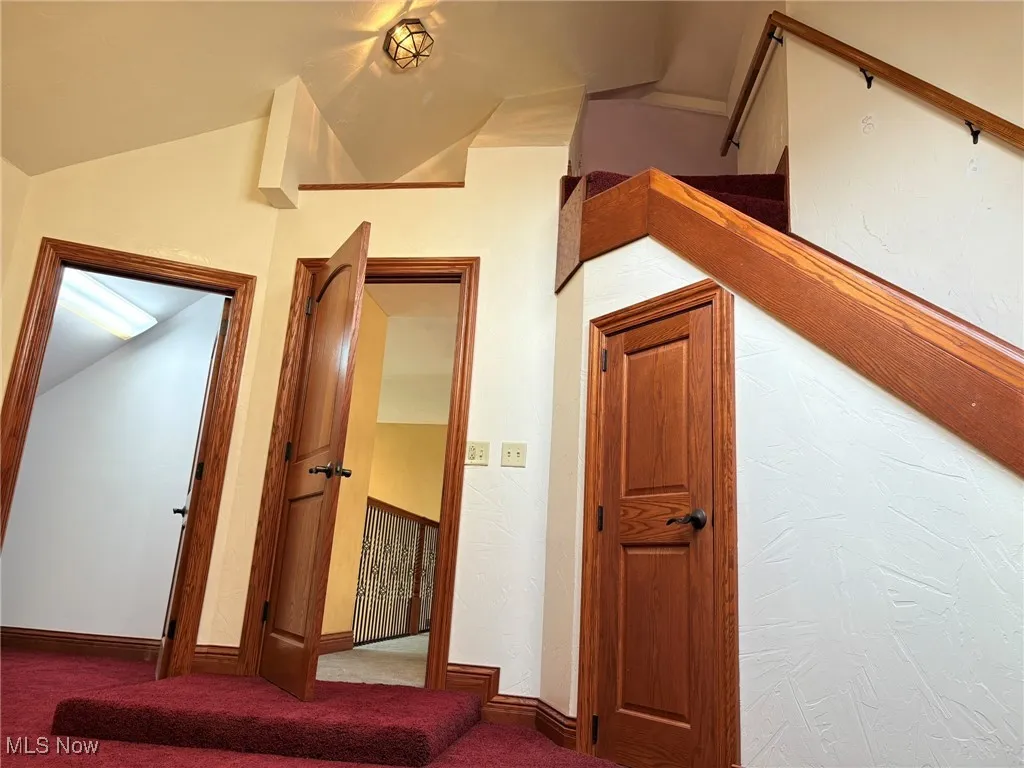 View of the steps going up into the loft area.