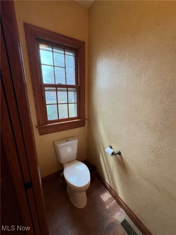 half bath off the laundry room.